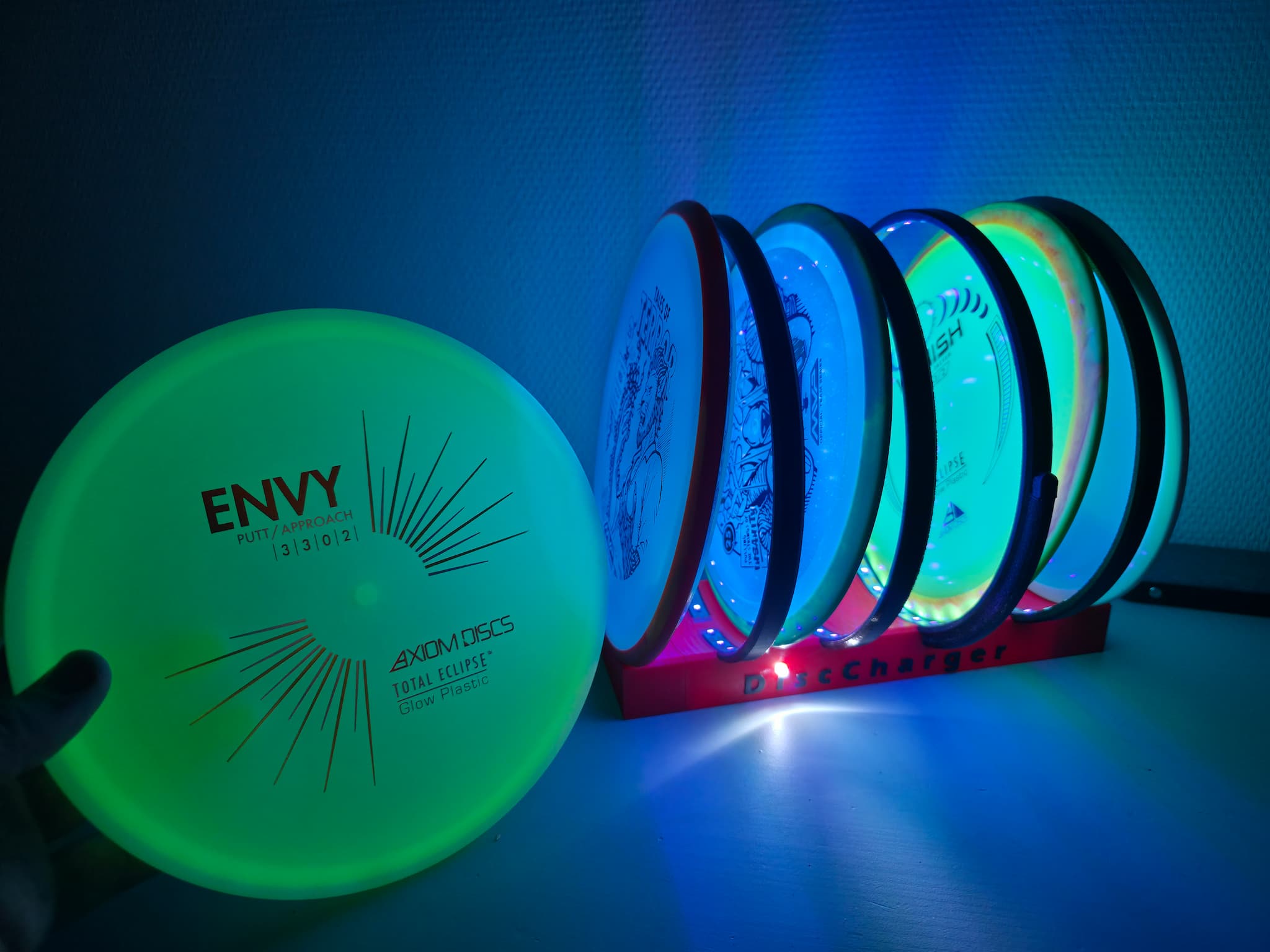Grønn glow-disc ved en DiscCharger